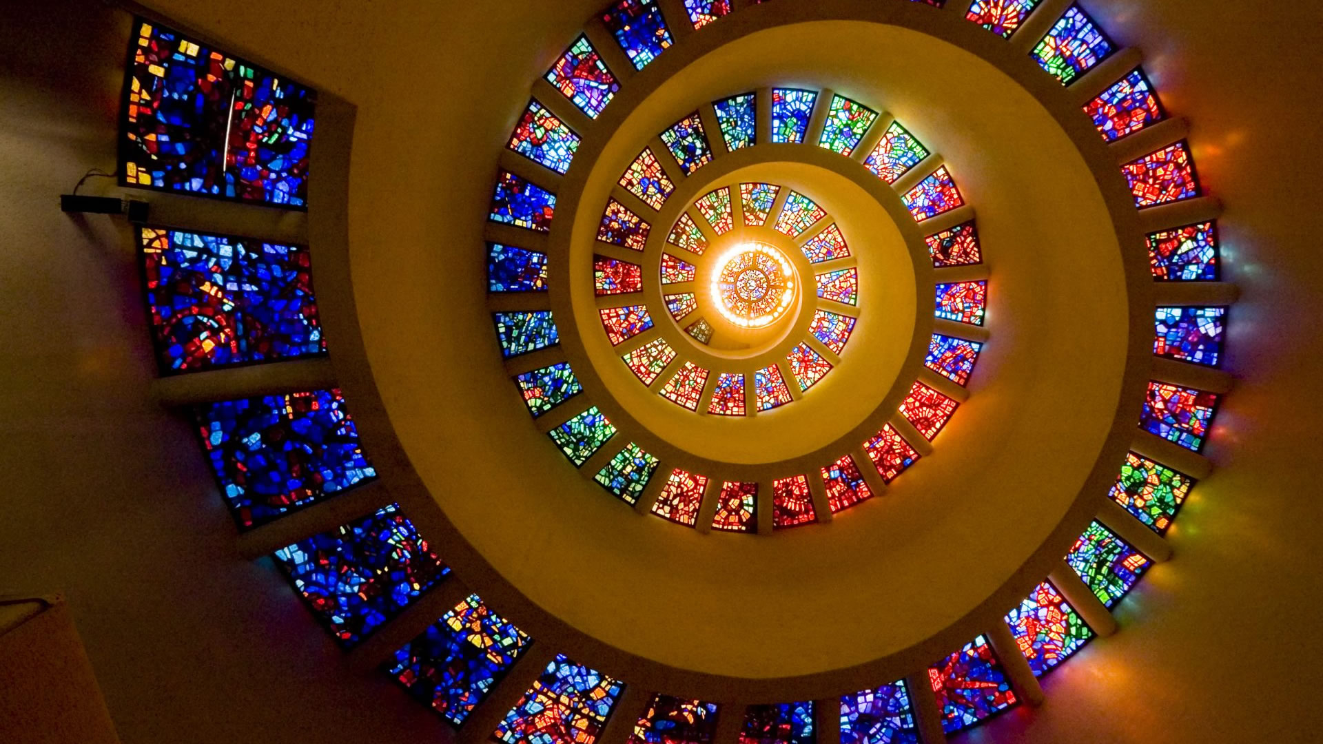 Explore the serene and stunning Thanks-giving Square chapel.